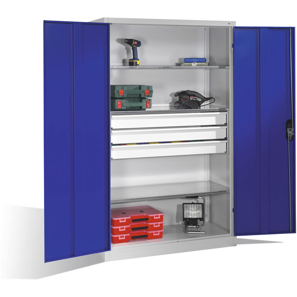 Flügeltüren-Stahlschrank SYSTEM TMF 110 | Enzianblau RAL 5010 | 1950 | 1200 | 600 | Schubladenblock mittig