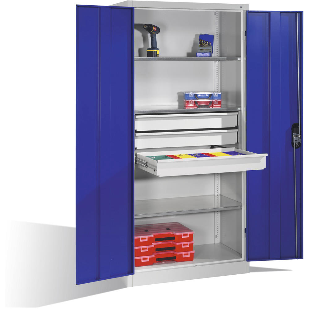 Flügeltüren-Stahlschrank SYSTEM TMF 110 | Enzianblau RAL 5010 | 1950 | 930 | 600 | Schubladenblock mittig